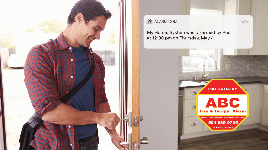 Man using the Alarm Com App Security System