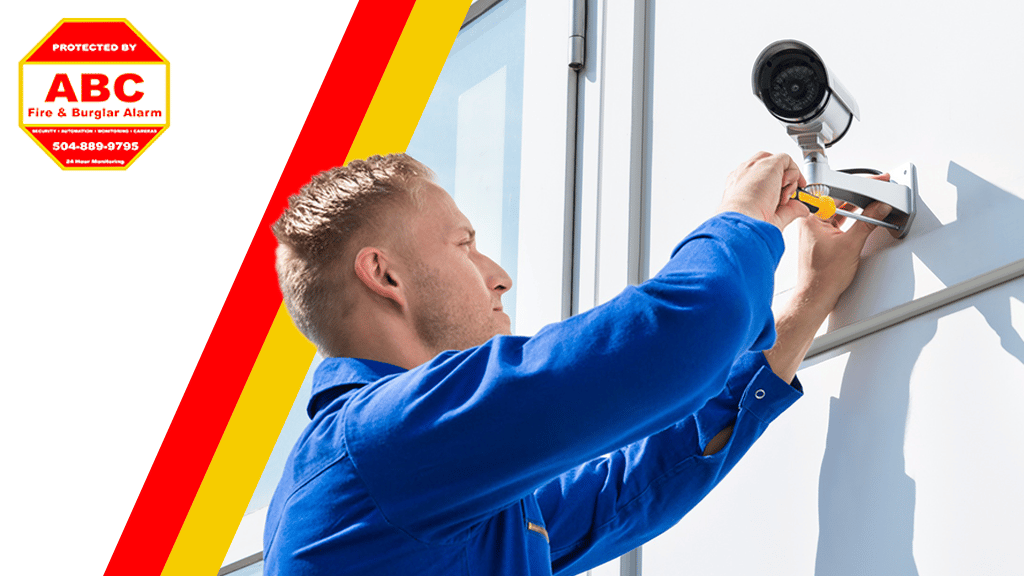 technician installing a video surveillance - budget security systems