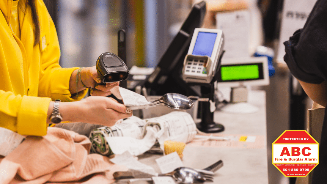 employee holding barcode
